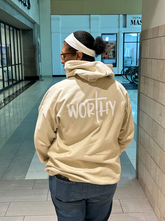 Sand hoodie with the word "Worthy" in white.